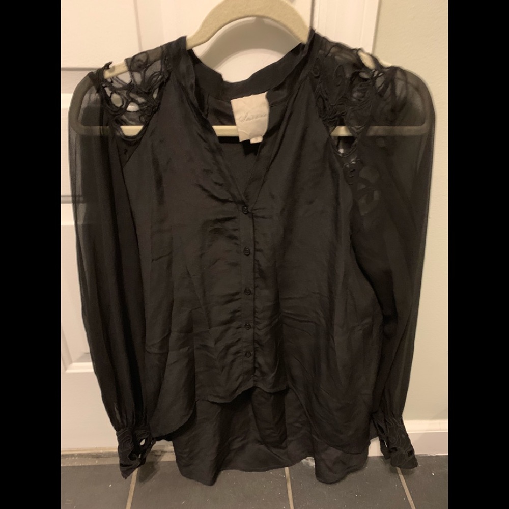 Black long sleeve blouse .